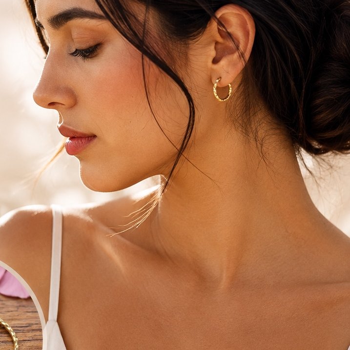 Aretes de argolla trenzada en oro de 14k