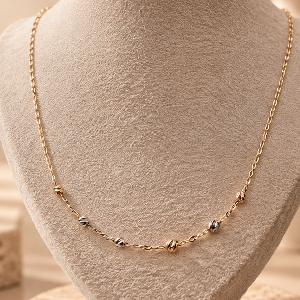 Cadena tricolor en oro de 14k